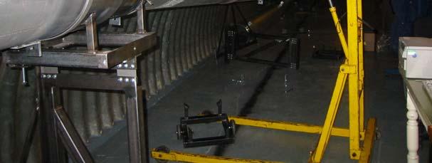 Installation of a pipe onto a stand showing the seal displaced to allow the pipe target to be inserted.