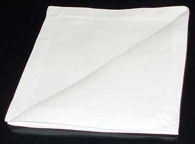 napkin so the open corner is facing away and to the left Fold