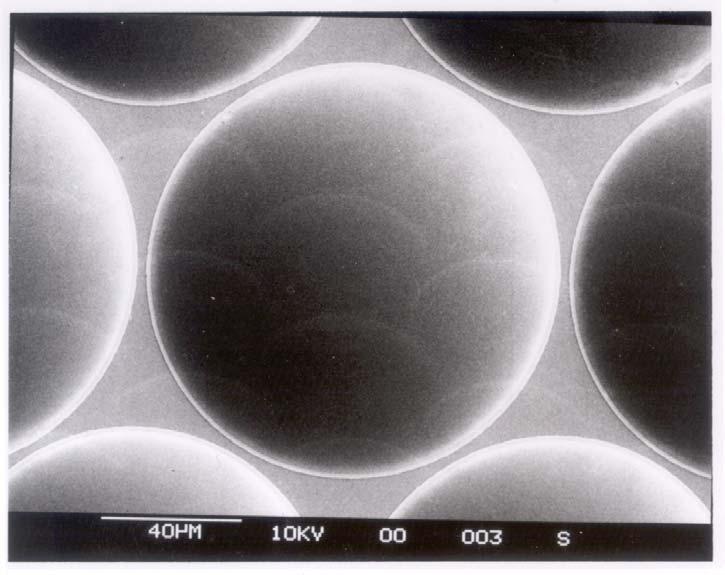 Microlens arrays Example shows lenses formed in photoresist on glass substrate.