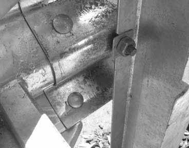 Bolt head and rail 1 to post 1 using the supplied M16 x 50mm (5/8 in x 2 in) guardrail post bolt. Use a 50mm x 50mm (2 in x 2 in) washer under the nut on the inside of post 1 (Figure 18).