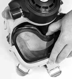 Make sure that the mask seal is seated in the mask frame correctly. Start installing the lens slightly below the top lens clamp for clearance when installing.