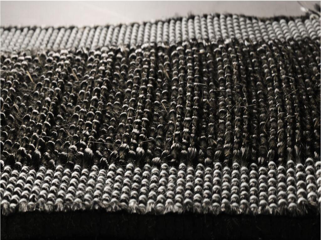 A machine woven Multi Layer: Weft yarns separated by
