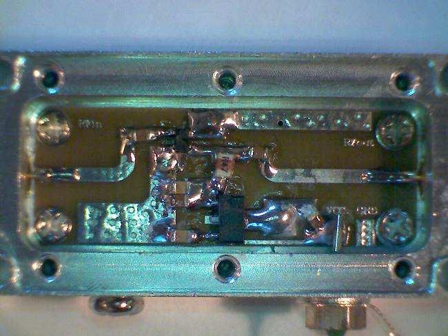 8. Amplifier construction The three amplifiers share the same basic construction a machined aluminum enclosure with covers held by screws.