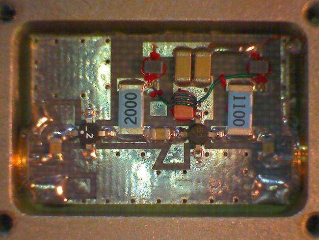 The two Mini- Circuits amplifiers appear to be machine-built while the Chinese CxLNA appears to be hand-built (figure 12). Figure 12 ~ Interior photographs.