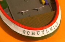 The name for the end of the hull was done in word-art to a curve with the same format/color as the