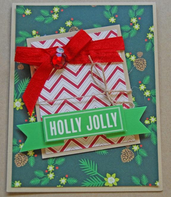 Save the remnants of the sticker for a later card! Holly Jolly Banner Card 1. Cut 4 ¼ x 11 from Kraft cardstock and fold in half. This is your card base 2. Cut 4 x 5 ¼ piece from Kringle & Co.