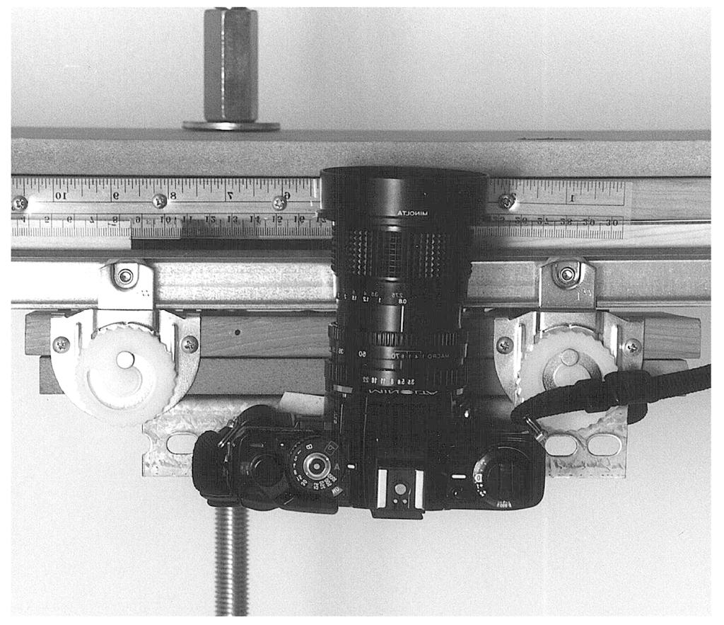 17. Camera mounts and structures designed by CAST: (a) mount for horizontal and vertical close-range stereo photography; and (b) vertical photography control structure a b Figure 17.
