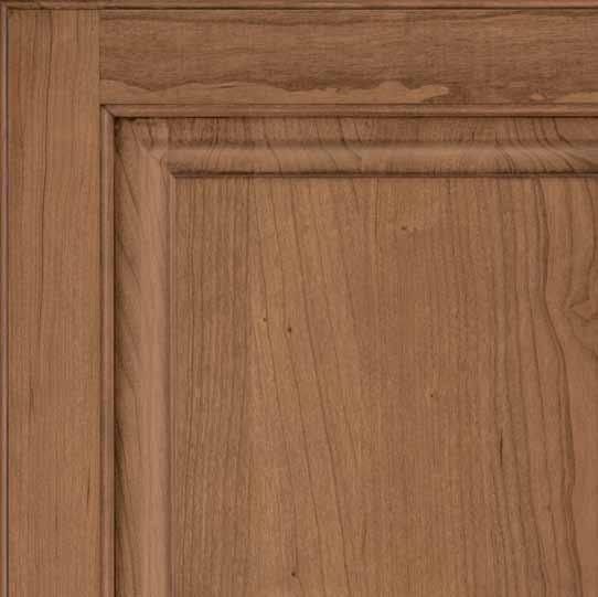 Suede topcoat softens the overall finish color and gives cabinetry a sophisticated appearance.