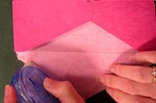 With wrong side of paper up, fold and finger press sides to the center of the envelope. Photo 11 10.