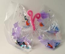Plastic Bag Butterfly Materials: Small Ziploc bags Pipe cleaners Collage materials Teacher prep: Gather materials Child s Process: Add several different types of collage materials to the butterfly