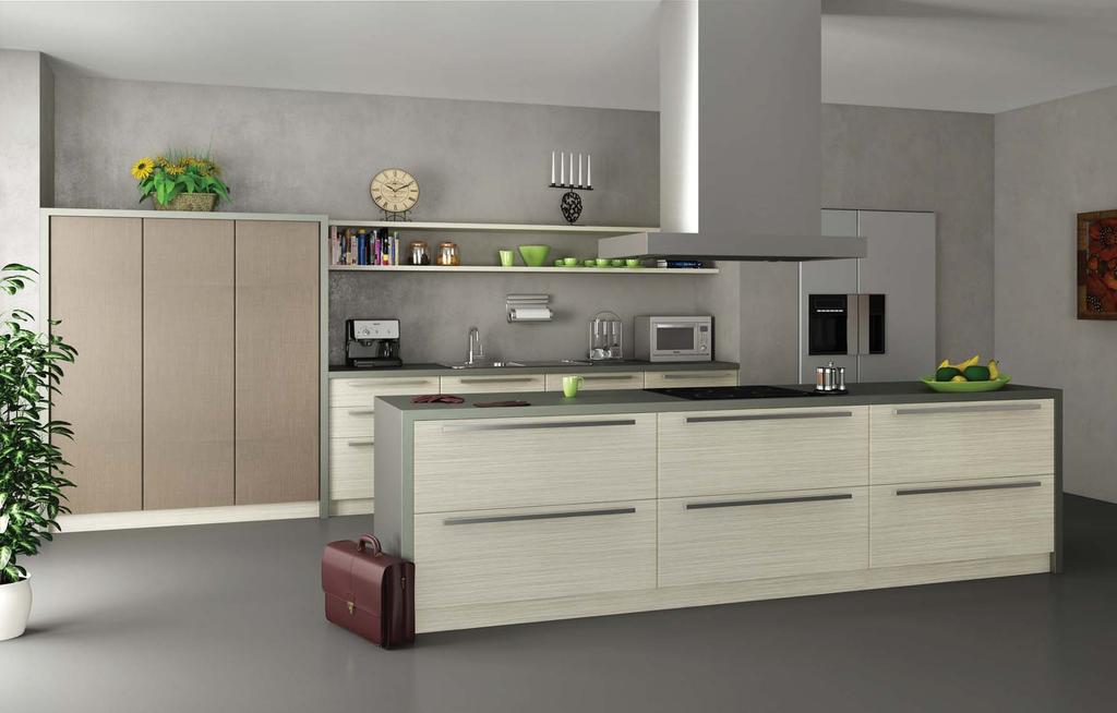 26 27 Fresh and casual, this kitchen combines dark brown furniture with