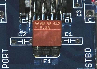 Procedure 3.5 Conduct Tests and Finish the Control Box Construction Steps: 1. Locate the fuse. If its leads are longer than about ¼" (6 mm), cut both leads to that length, as shown in Figure 3.5-1. 2.