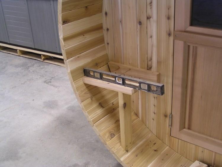 You will attach an exterior benches wall cleat to the sauna wall, using a level to insure that the seat is level. Note for Grandview Barrel The Grandview Barrel Sauna has duckboard flooring sections.