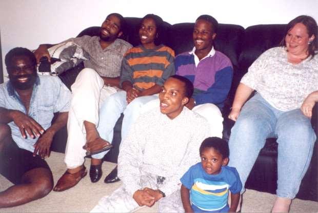 Philip Emeagwali (far left) at his home with visiting computer science students of the University of Minnesota that he was