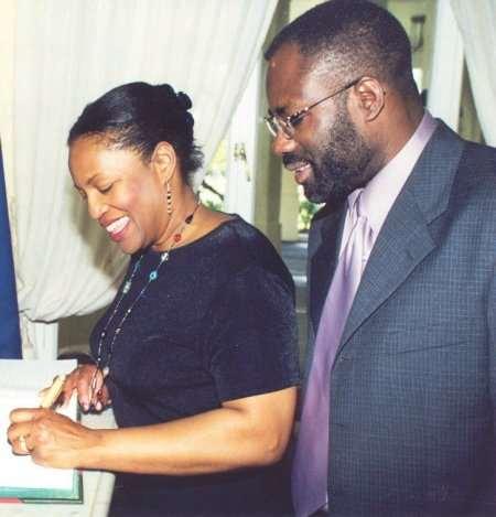 Philip Emeagwali: Family 49 Dale and Philip Emeagwali signs the Governor-General's guestbook.