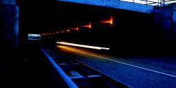When to light by day This depends on a number of factors including the length of the tunnel, visibility of the exit, penetration of daylight, brightness of the walls, and traffic density.