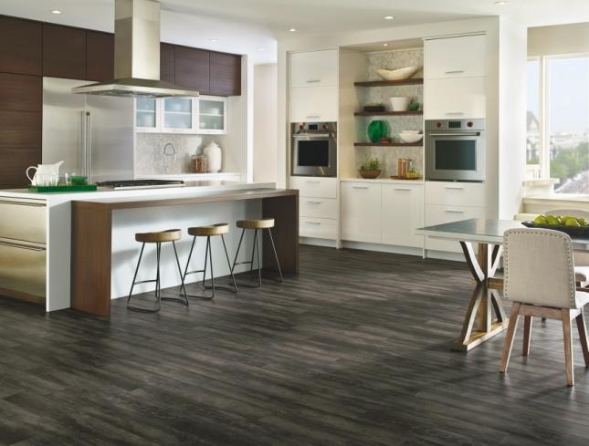 LUXURY VINYL FLOORING Armstrong Luxe Plank with FasTak - 6- Concrete Structures Gotham City Groveland Natural Luxe Plank with FasTak is being offering nationally at retail.