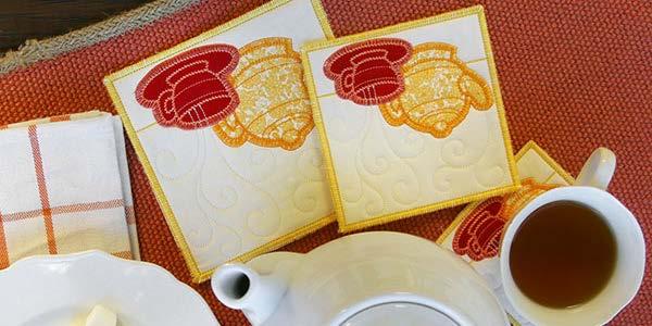 Applique Mug Rugs (In-the-Hoop) Treat your favorite coffee and tea lovers (including yourself!) with a cozy mug rug stitched entirely in-thehoop. Applique details make these designs extra delicious.