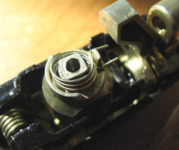 The spring forces the lock cylinder back to center whenever you lock or unlock the car.