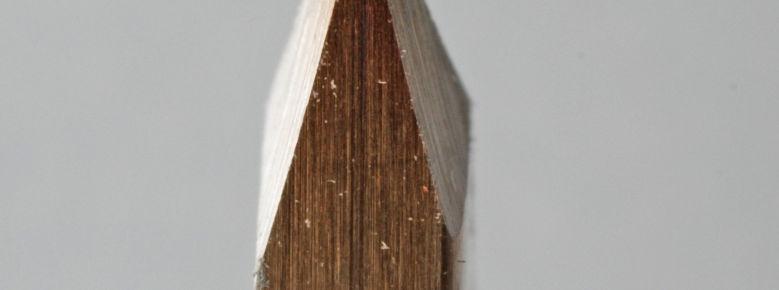 The other two grooves are 105 apart from the first groove and 5-7/8 from the tip of the tool.