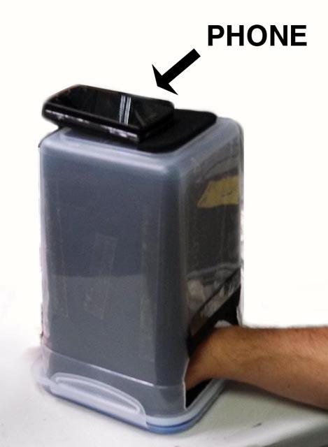 Fig.4. (left) Side view and (right) Top view of scanner #1, showing mobile phone application for recording vein images.