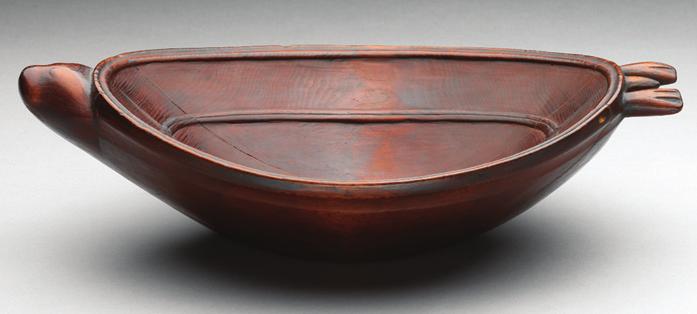 A carver from the Chugach people of Alaska made this wood bowl around 1800. were known for carved wooden masks made for healing ceremonies and for small carved objects of ivory and soapstone.