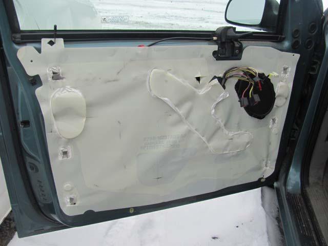 STEP 5: Remove the interior door trim panel by pulling the bottom of the door