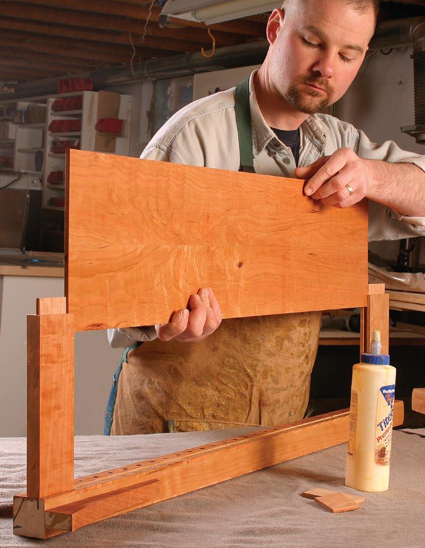 Assemble the bookcase in stages Prefinishing saves hours of time cleaning glue squeeze-out. Shop towels shoved into the mortises keep them finish free to ensure glue adhesion.