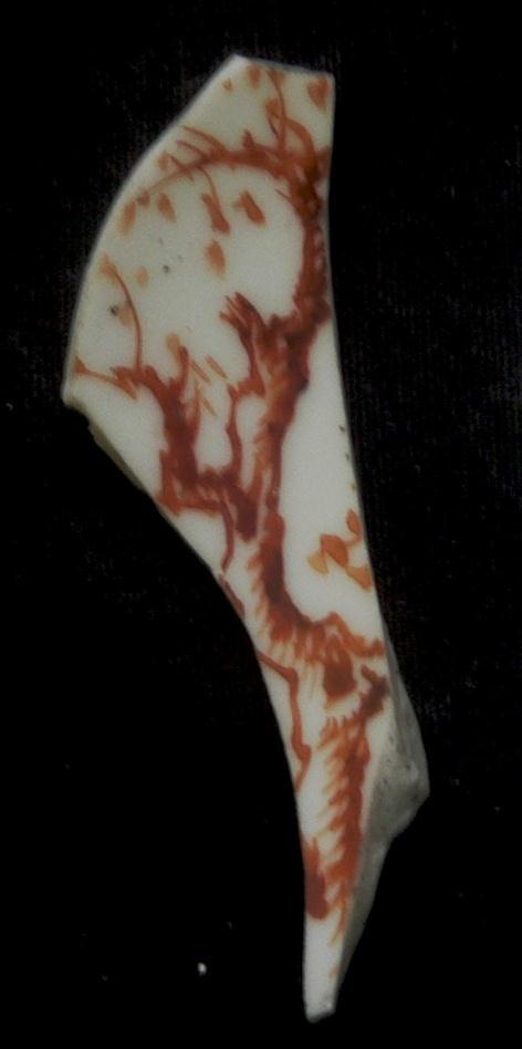 12 (No 1-22) 1220 Saucer 1 22 One small shard from a Chinese Ch ien Lung period porcelain saucer decorated with a gnarled tree in iron red.