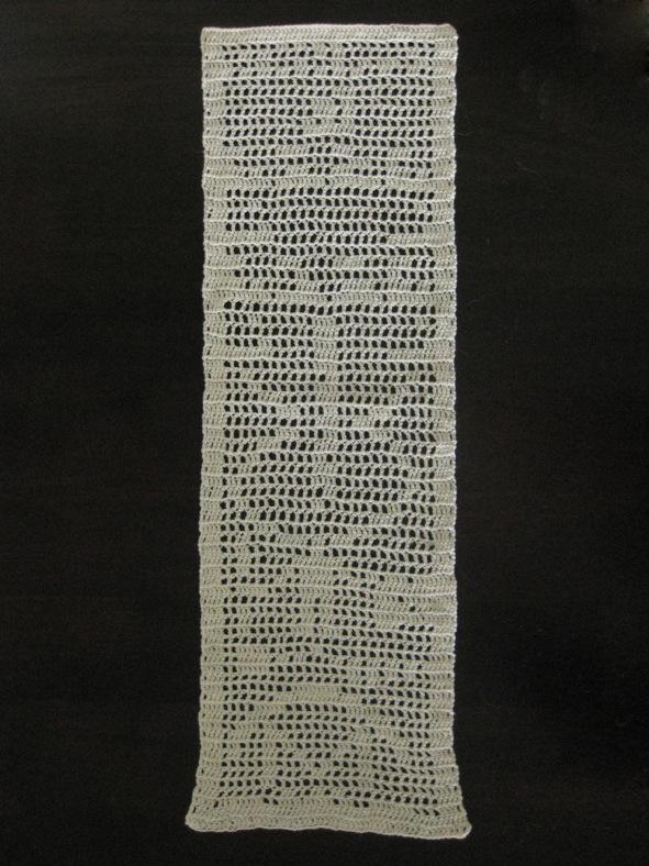 ARECIBO MESSAGE Filet crochet by Devon Message written by Carl Sagan (and others), broadcast into space via radio wave in 1974 Includes atomic numbers, double helix of DNA, graphic of solar system,