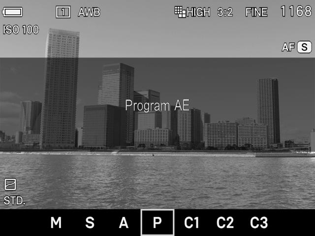 Select the exposure mode (P.49) Press the Mode button in P (Program AE) position Focus (P.