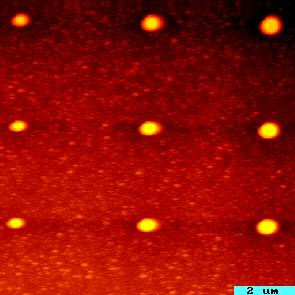 I-V measurements are performed with the homemade AFM system in vacuum (5 10-5 Torr) at room temperature first. The AFM is first operated in the topographic mode to locate dot array.