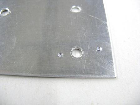 If the holes are not properly aligned, remove the drill guide and use it as a template to make a replacement drill guide
