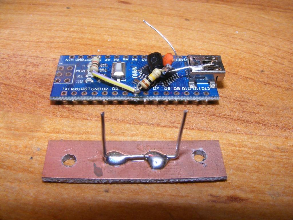 Many Arduino Nano boards don't provide much in the way of mounting the board itself. I used a scrap of circuit board and a U shaped piece of wire soldered to it for mounting.