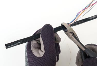 Remove jacket and cut the insulated conductors to required length for termination, ensuring removal of the first three to four inches (see step 1).