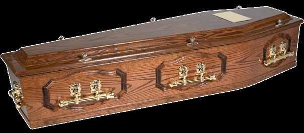 This dignified coffin is polished to a gloss finish and furnished here with electro brass handles.