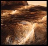 ORILAG CREAM THROW Natural Orylag in full hides. Back in wool, angora and cashmere. Orylag, a breed of rabbit, is a controlled rarity, a new generation of luxury.