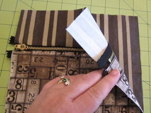 5. Place the front zippered pocket panel right side up on