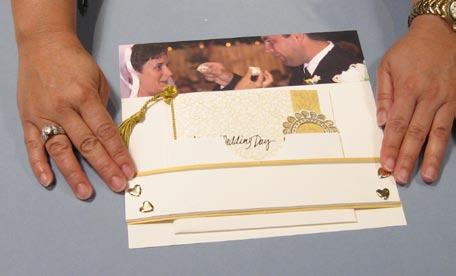 12 For her congratulations card, Judi made a pocket from a bronze envelope, cutting 1 " off of the top of the sealed envelope.