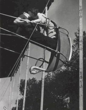 5 15. Brassaï French, born Hungary, 1899-198 Kiss on the Swing, 1935-37 Image: 29.7 x 23.