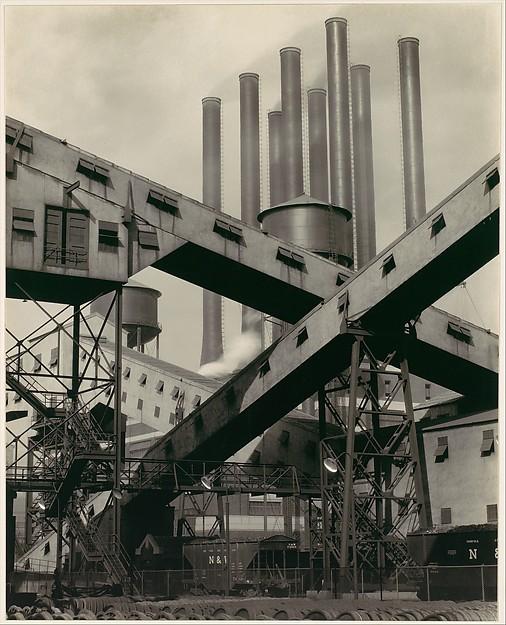 Charles Sheeler was asked to create promotional photos of the Ford plant in Michigan.