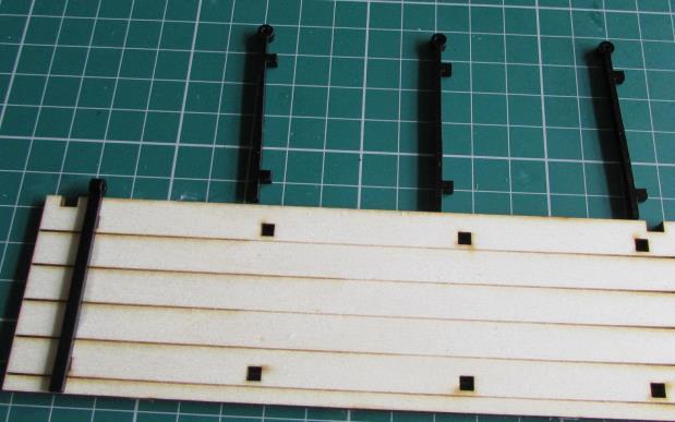 Glue four acrylic hinge beams to a lid (planking facing up) with super glue