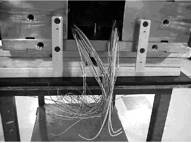 1) Run all the wiring through wire slots in the cavity plate out to the location of the wiring box. Doc003117.