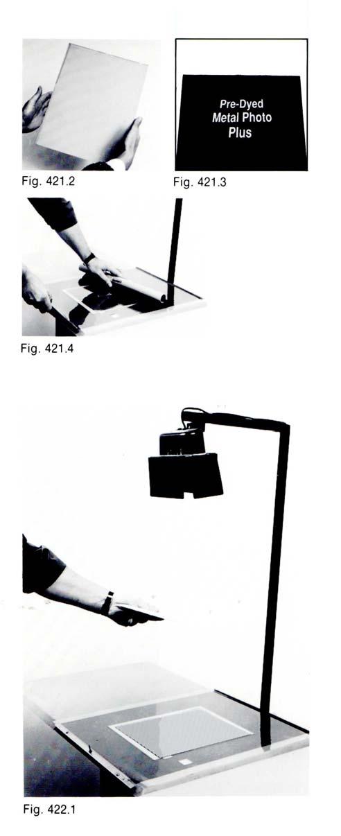 . Hold the paper halfway between the light source and the exposure plane. The paper should be at least 6 inches from the lamp to avoid a fire hazard. (Fig. 422.