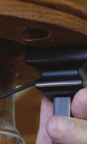 9. 14 Twist/Rotate metal baluster counter-clockwise (when viewed from above) so that baluster rises into handrail.