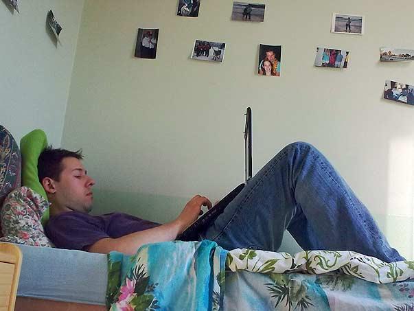 Figure 1. A probe participant checking his email while in bed. Figure 2. Two participants sharing the same table using their laptops. Figure 3.