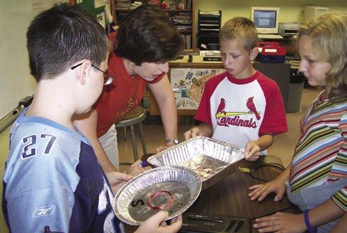 After making coffee can speakers, students are eager to improve their speakers by using different materials, such as pie pans.
