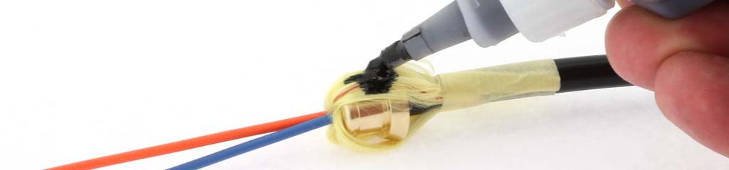 Before the instant adhesive begins to harden,quickly slide the ear clamp over the fiber,