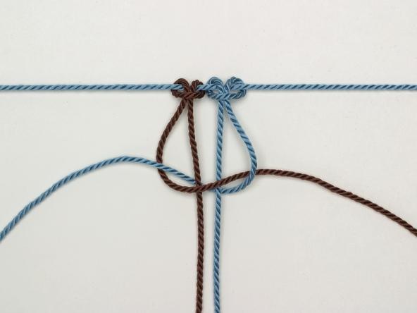 Step 3 Half-knot: Is the first half of a square knot. Bring the left cord over the 2 center cords, like an L.