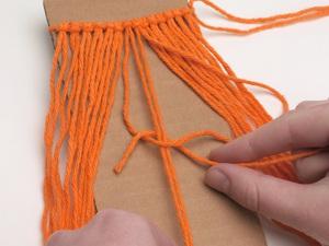 Tie the same 7 knots on the backside.